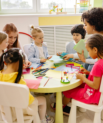 Children working on a craft activity in a classroom